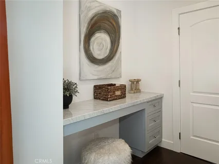 a bedroom with bed and a window