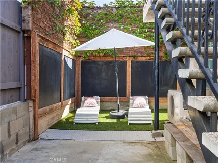 a room with a table and chairs