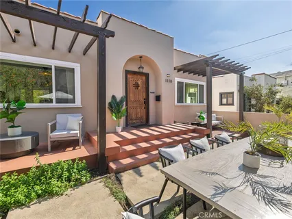a front view of a house with a glass door