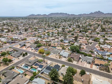 an aerial view of a city with lots of residential buildings