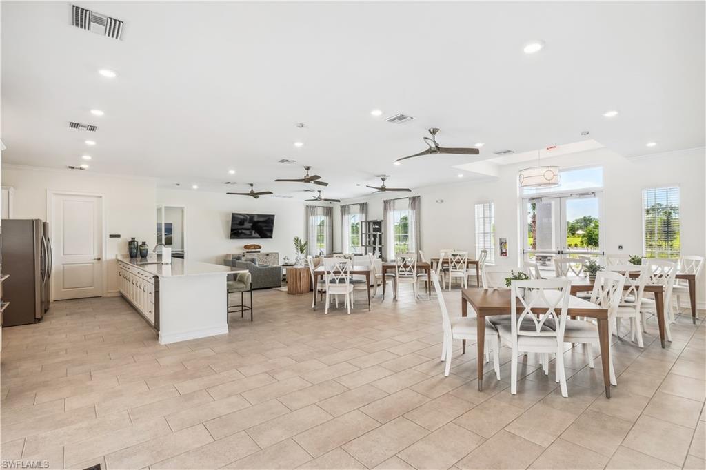 17752 Shade Tree Loop Punta Gorda, FL 33982 - Photo 17 of 40 a view of a dining area with furniture