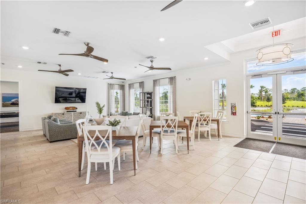 17752 Shade Tree Loop Punta Gorda, FL 33982 - Photo 18 of 40 a view of a dining area with furniture