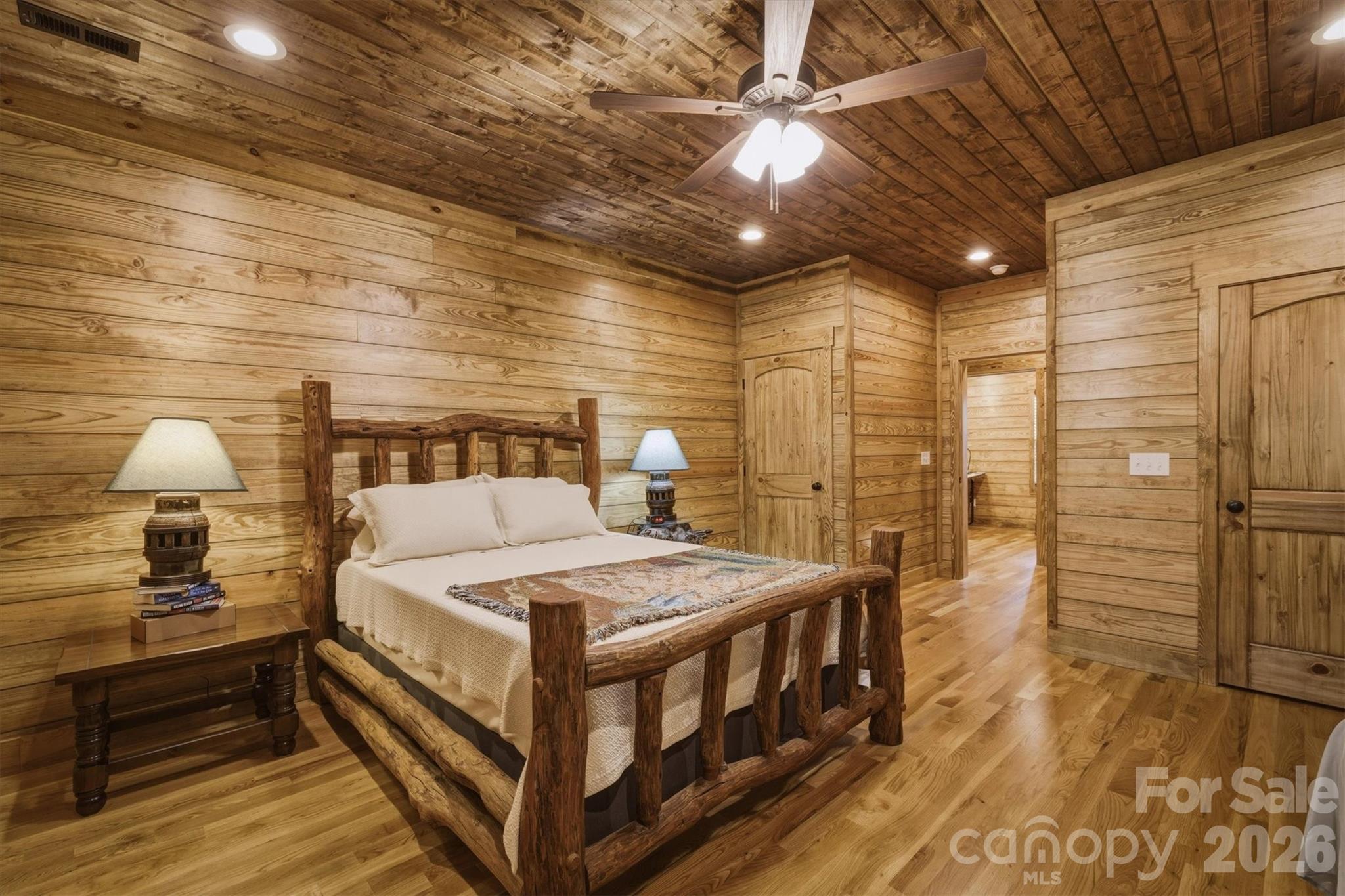 7490 Oak Ridge Church Road Connelly Springs, NC 28612 - Photo 26 of 44 a bed room with a bed and a lamp