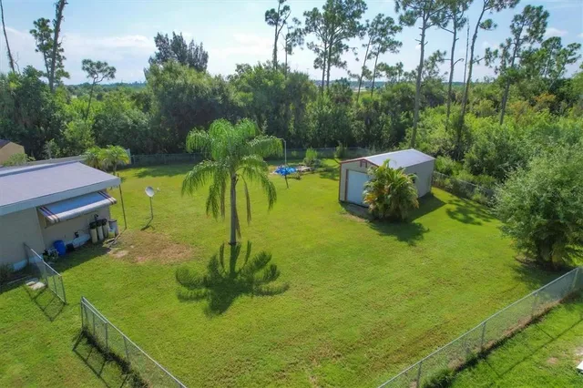 an aerial view of a house with a garden