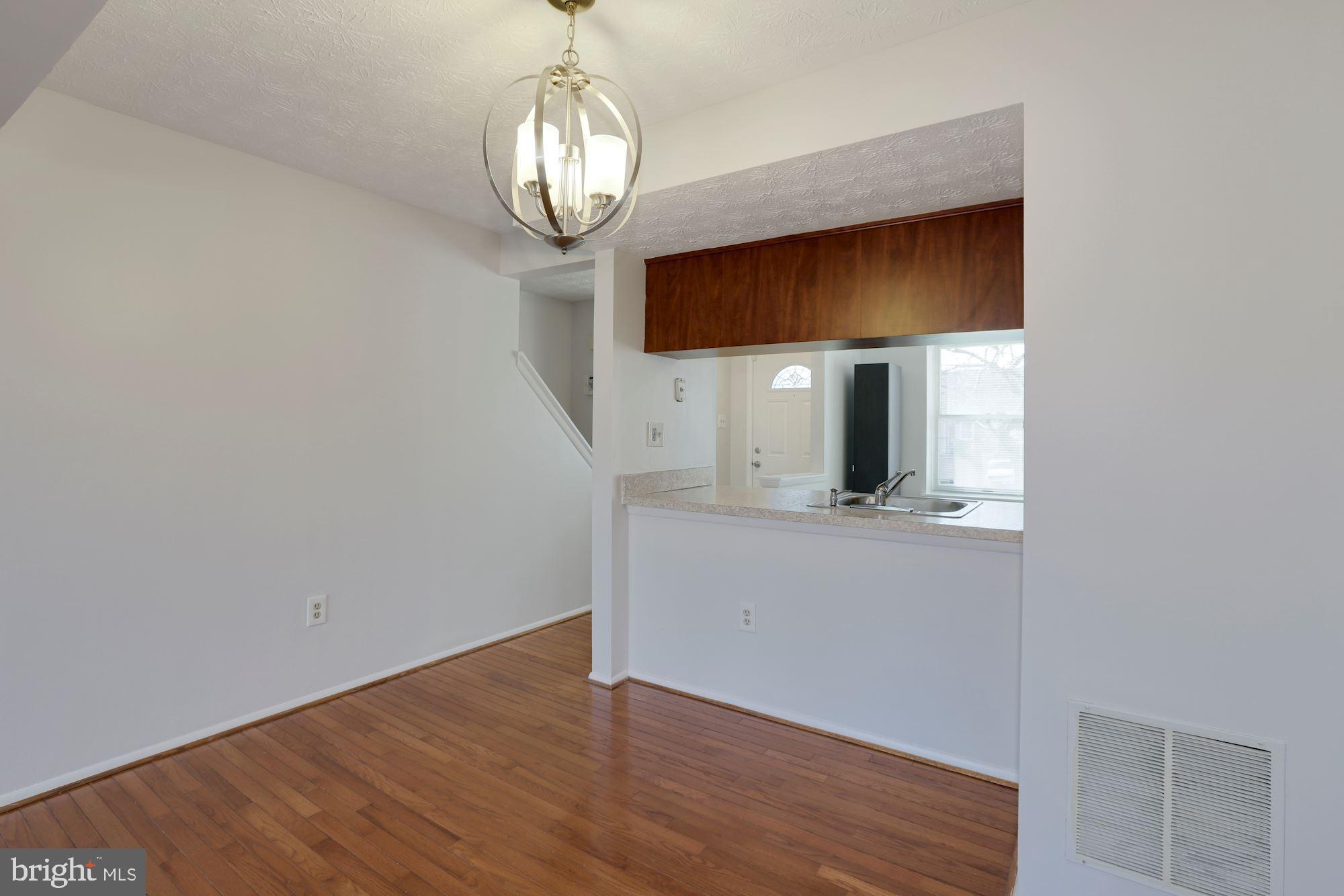 3740 Castle Terrace, Unit 120145 Silver Spring, MD 20904 - Photo 11 of 35 Dining + Living Area
