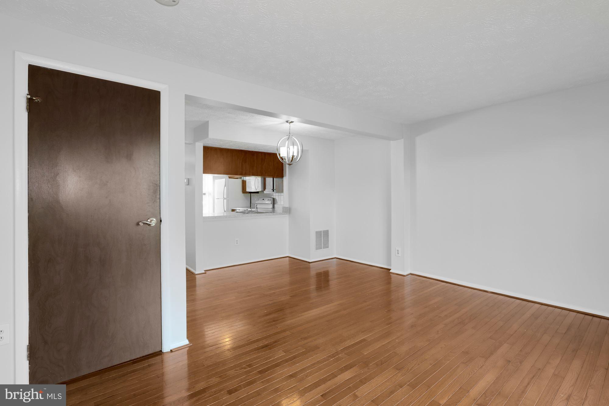 3740 Castle Terrace, Unit 120145 Silver Spring, MD 20904 - Photo 13 of 35 Dining + Living Area