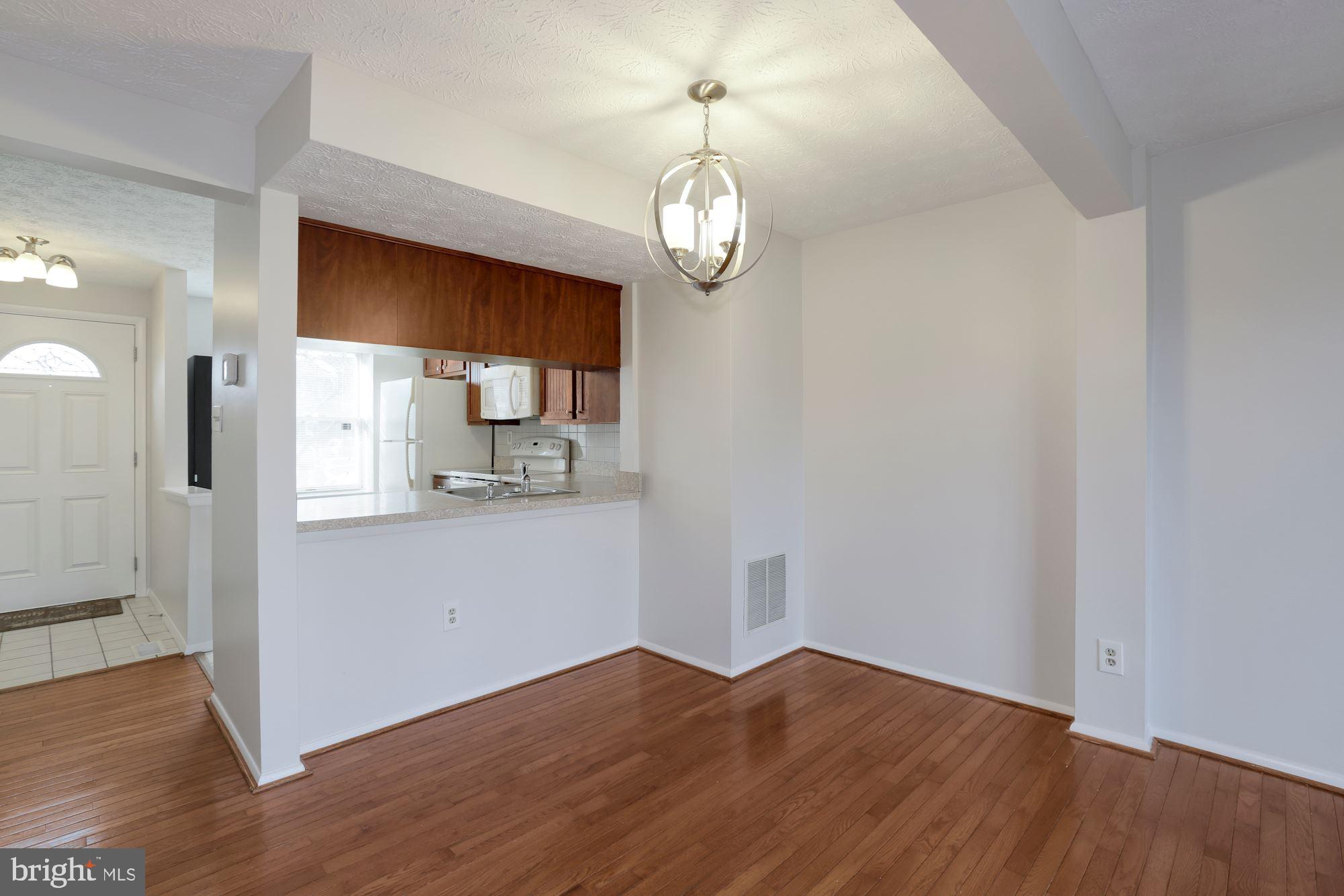 3740 Castle Terrace, Unit 120145 Silver Spring, MD 20904 - Photo 10 of 35 Dining + Living Area