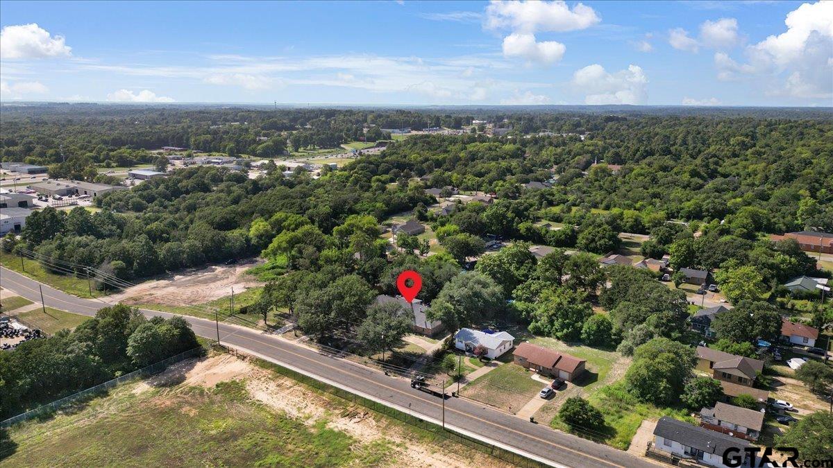3109 West Shaw Street Tyler, TX 75701 - Photo 24 of 27 an aerial view of residential houses with outdoor space and swimming pool