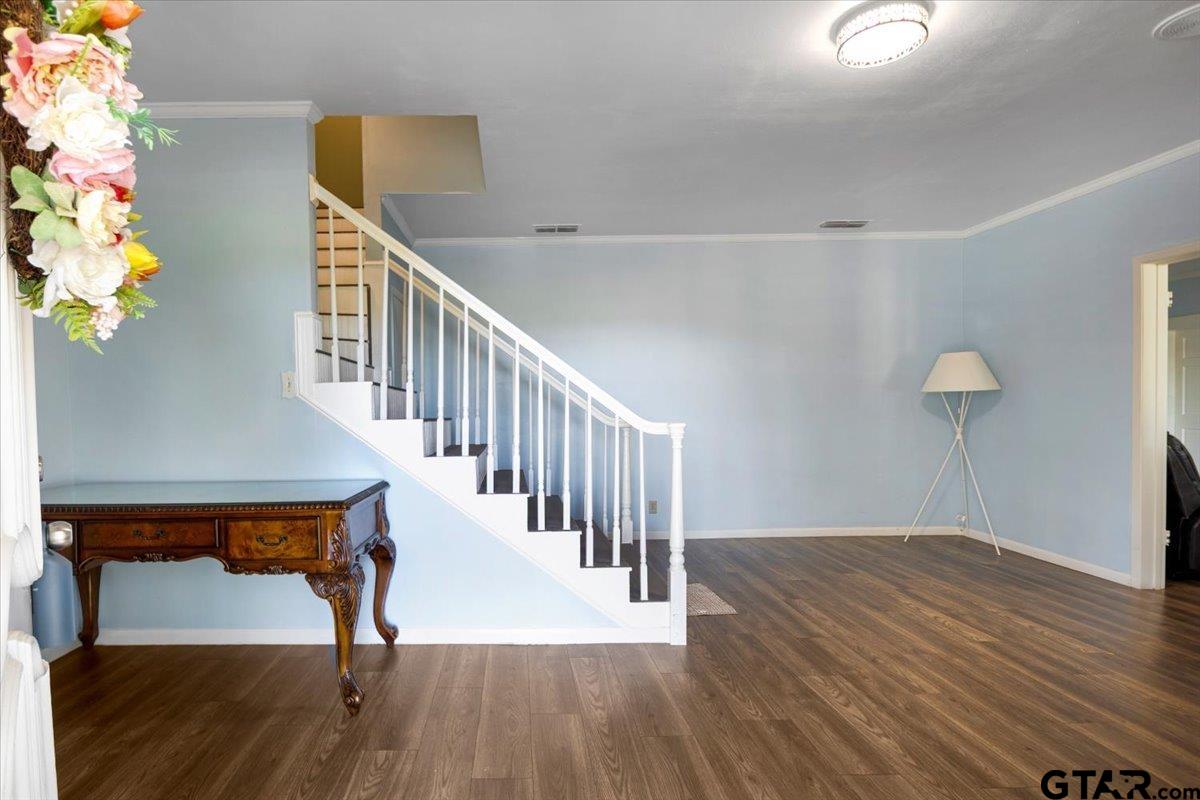3109 West Shaw Street Tyler, TX 75701 - Photo 4 of 27 a view of entryway with wooden floor