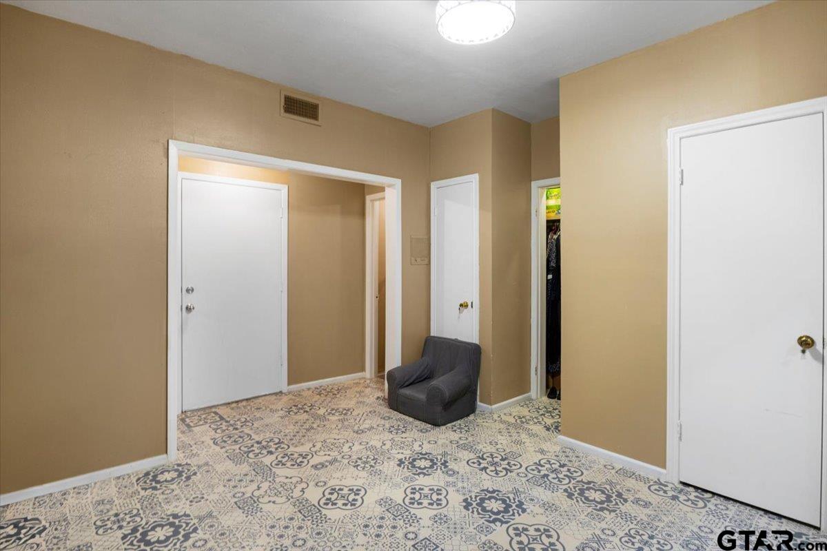 3109 West Shaw Street Tyler, TX 75701 - Photo 8 of 27 a view of a bedroom