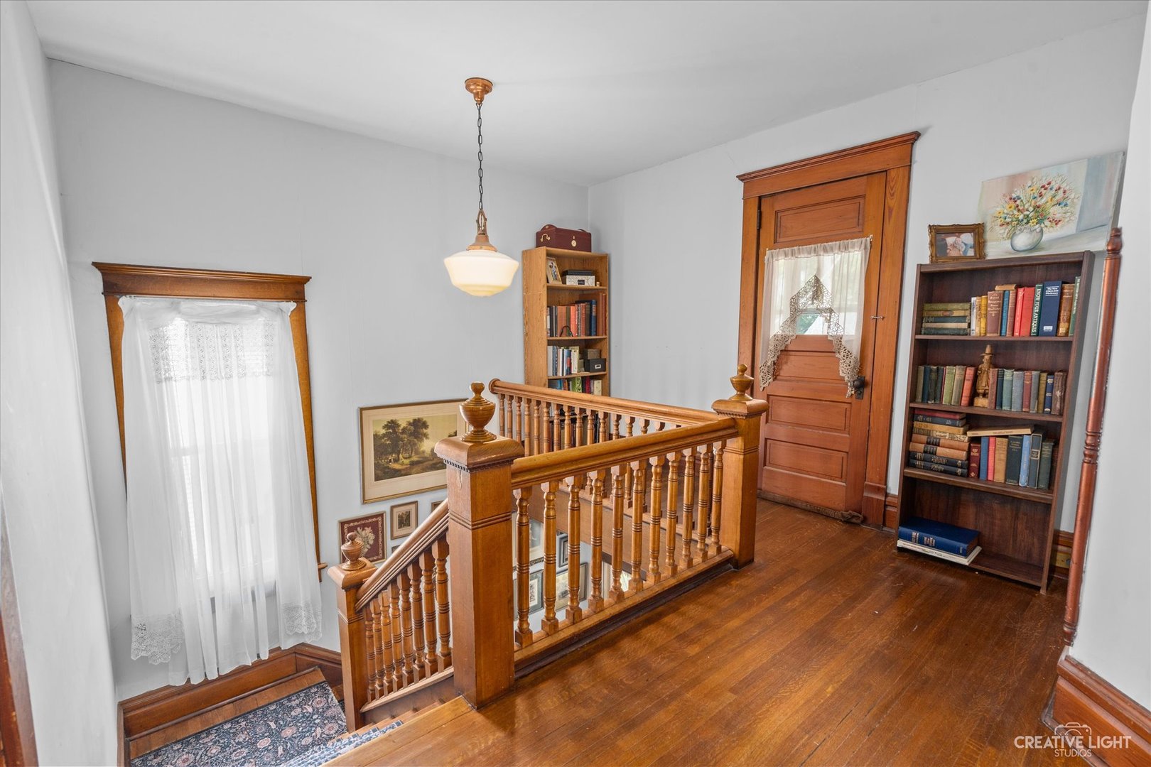 322 East 3rd Street Dixon, IL 61021 - Photo 16 of 30 a bedroom with furniture and a book shelf