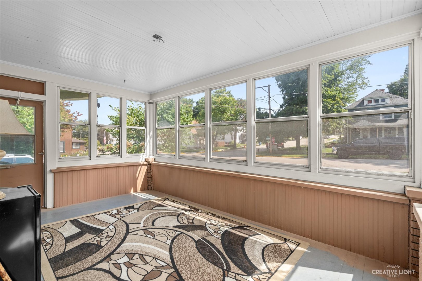 322 East 3rd Street Dixon, IL 61021 - Photo 18 of 30 a bed sitting in a bedroom next to a window