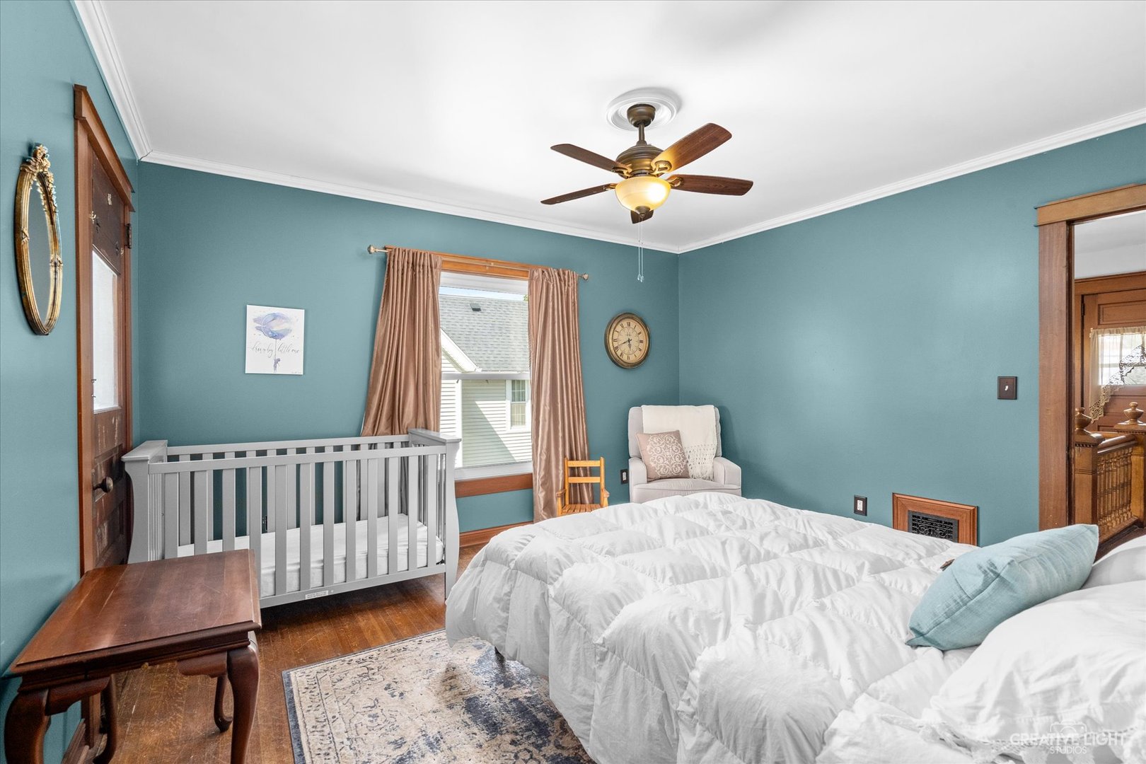322 East 3rd Street Dixon, IL 61021 - Photo 19 of 30 a bedroom with a bed and a window