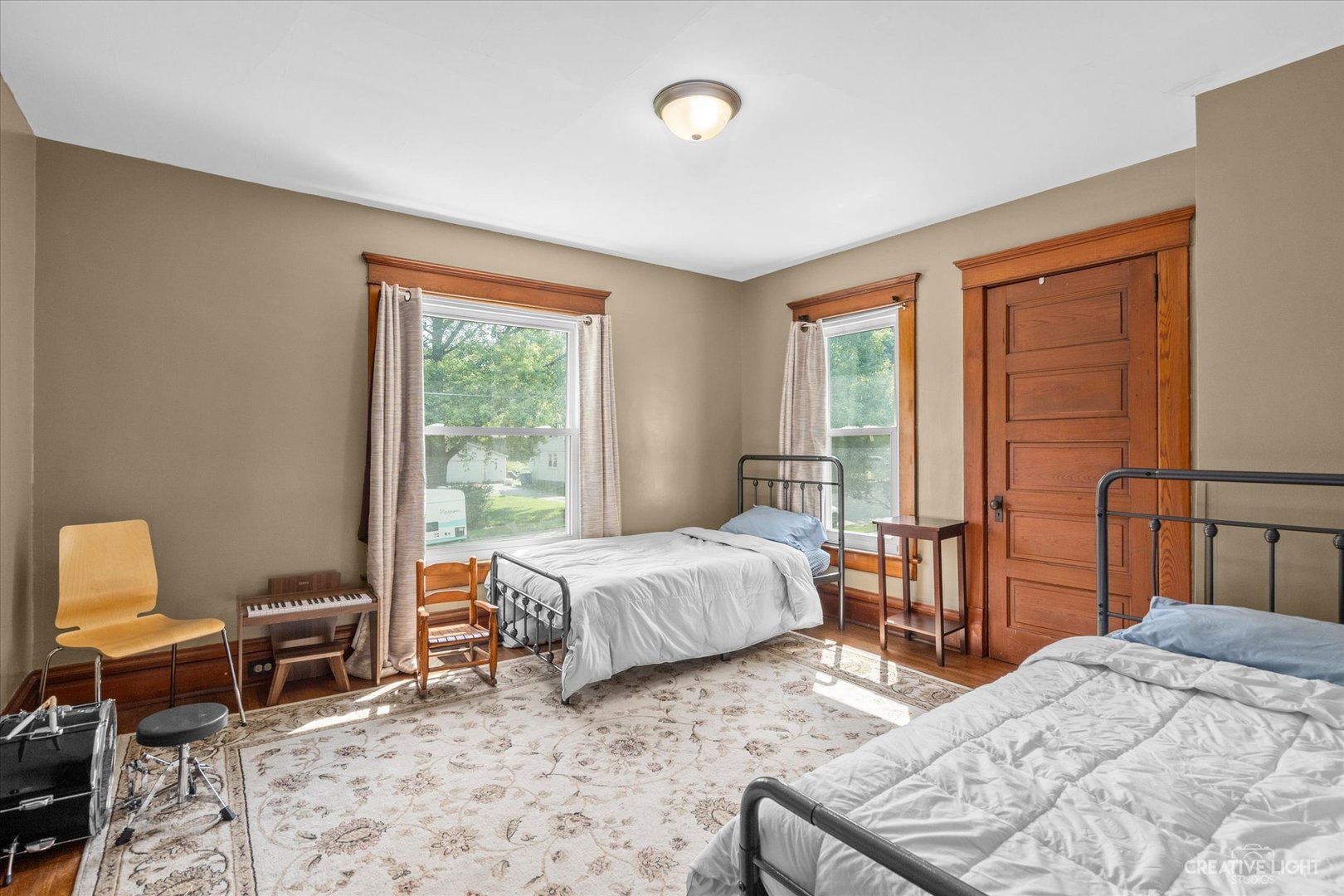 322 East 3rd Street Dixon, IL 61021 - Photo 21 of 30 a bedroom with two beds and a window