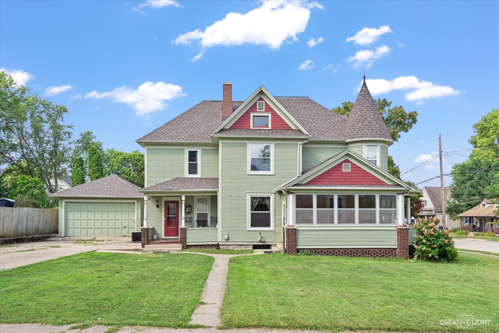 322 East 3rd Street Dixon, IL 61021 - Photo 25 of 30 a front view of a house with a yard