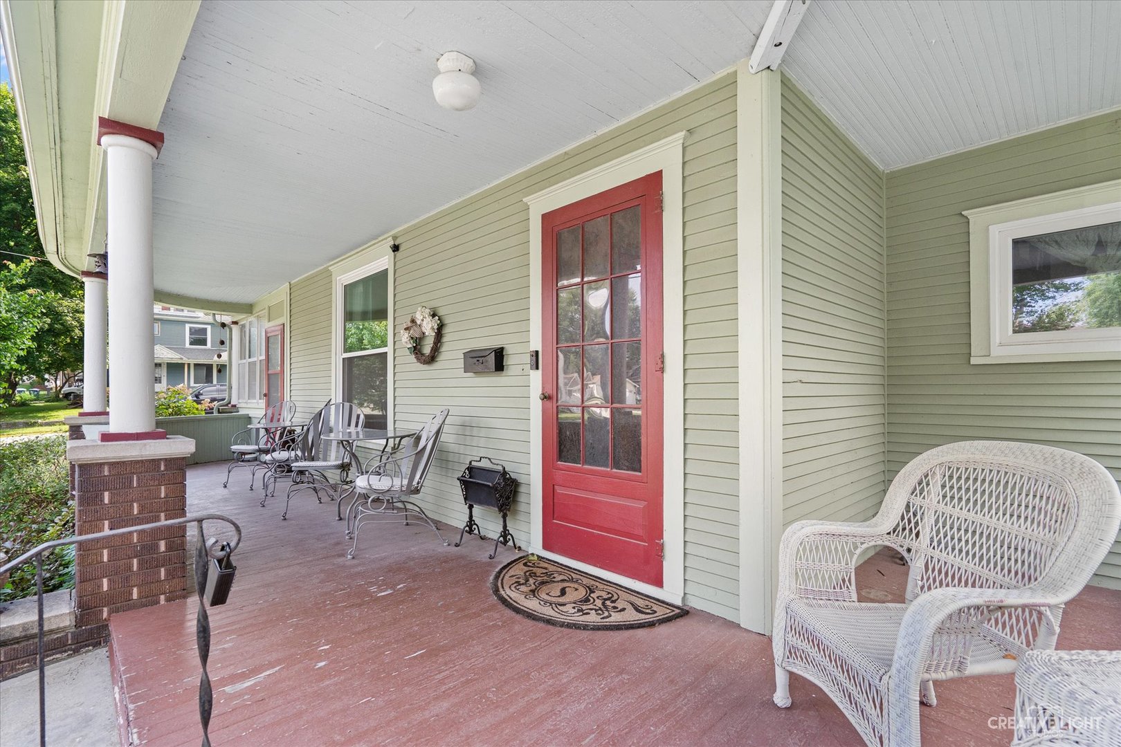 322 East 3rd Street Dixon, IL 61021 - Photo 3 of 30 a living room with furniture and wooden floor