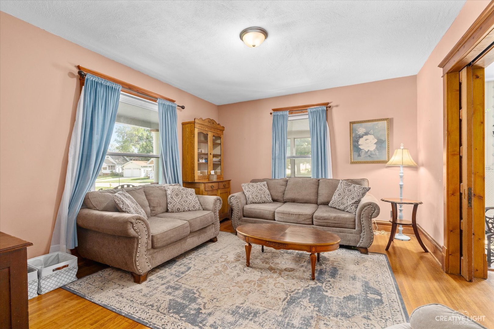 322 East 3rd Street Dixon, IL 61021 - Photo 5 of 30 a living room with furniture and a large window