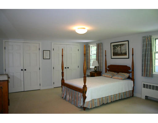 17 Parmenter Road Wayland, MA 01778 - Photo 12 of 18 a bedroom with a bed and a night stand