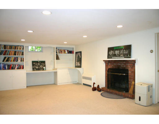 17 Parmenter Road Wayland, MA 01778 - Photo 15 of 18 a living room with furniture and a fireplace