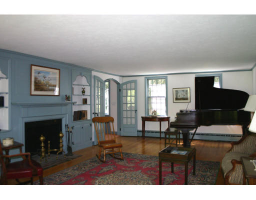 17 Parmenter Road Wayland, MA 01778 - Photo 3 of 18 a living room with furniture and a fireplace
