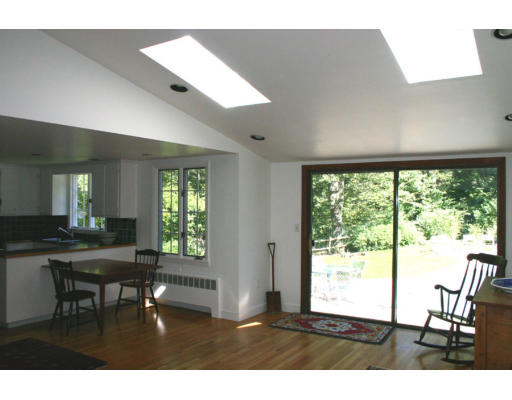 17 Parmenter Road Wayland, MA 01778 - Photo 7 of 18 a living room with furniture and a large window