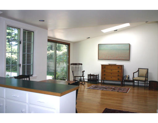 17 Parmenter Road Wayland, MA 01778 - Photo 8 of 18 a living room with fireplace furniture and a flat screen tv