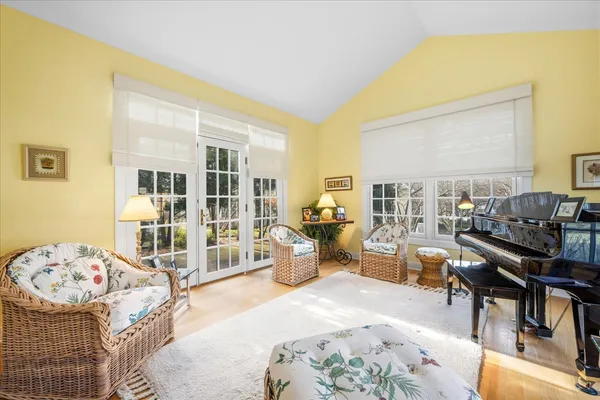 a living room with furniture and a table