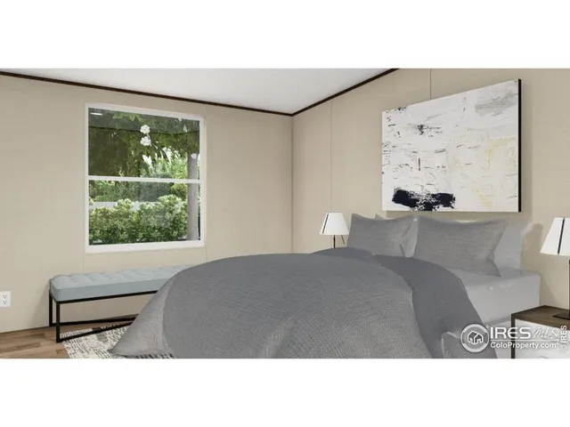 a living room with a couch and a large window