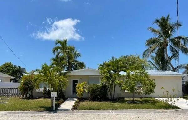 a plant in front of a house