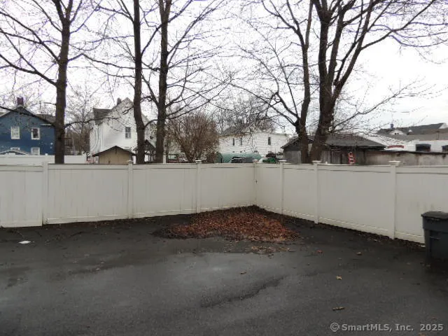 a view of a house with a snow and trees