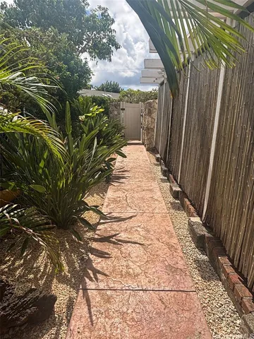 a view of a pathway both side of building