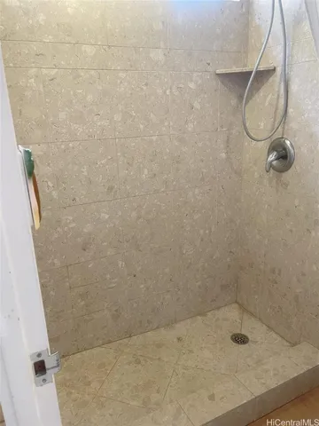 a bathroom with a bath tub