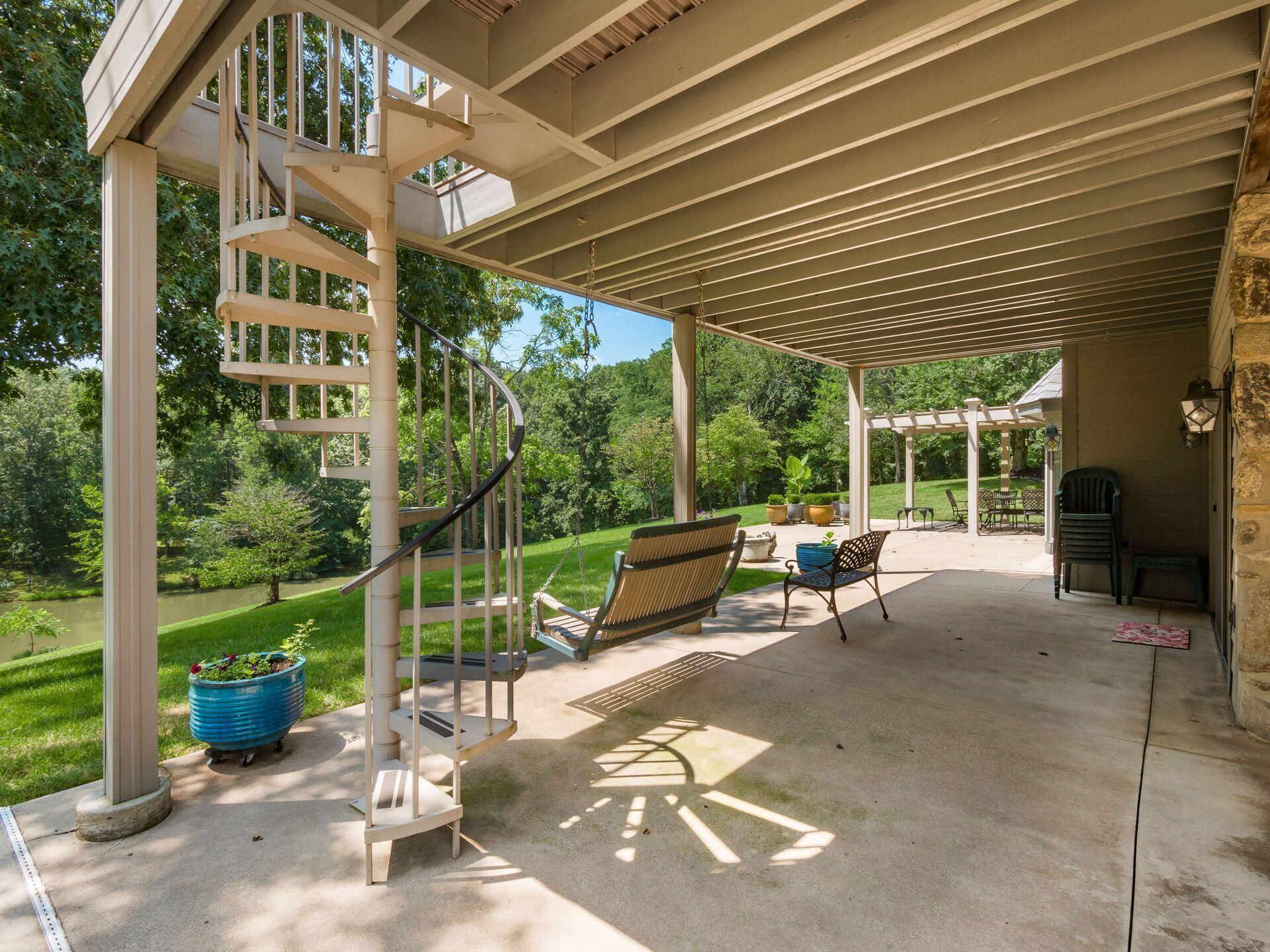 236 Tom Corwin Road Wellston, OH 45692 - Photo 57 of 104 SPIRAL STAIRCASE TO UPPER LEVEL DECK