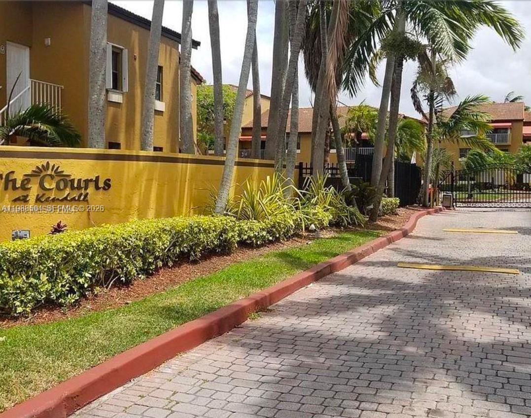 a street sign on the side of building