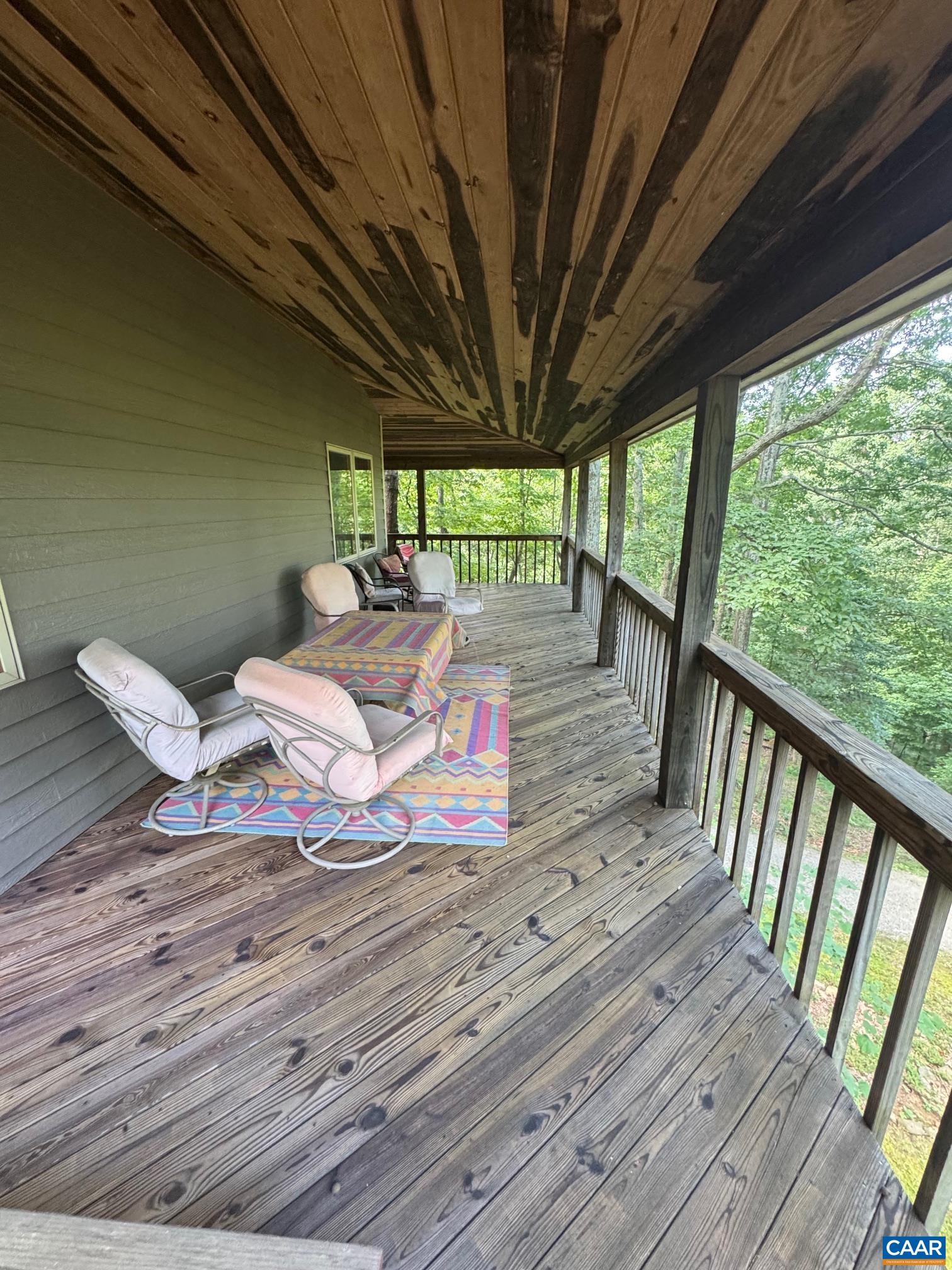 1950 Locust Hollow Road Charlottesville, VA 22903 - Photo 17 of 54 a bedroom with furniture wooden floor and outdoor seating