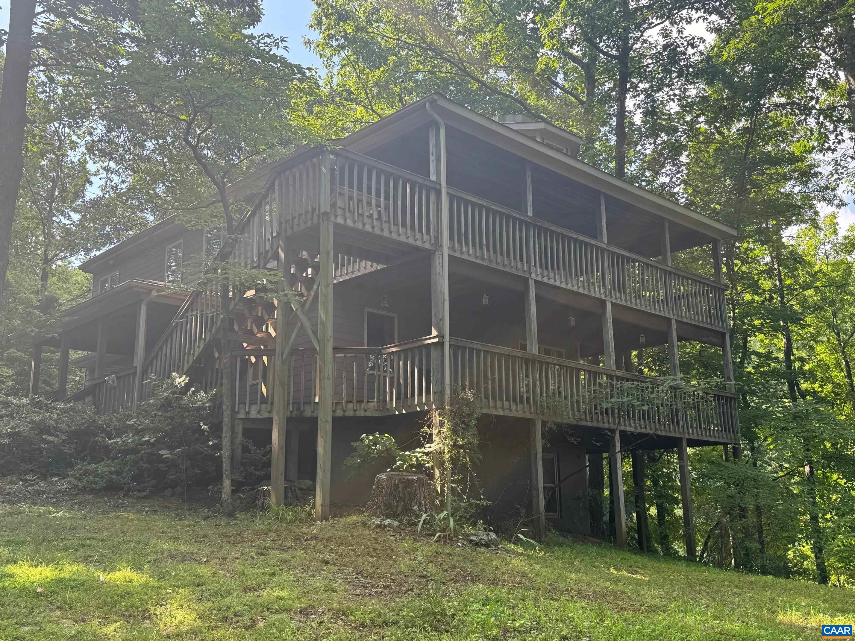 1950 Locust Hollow Road Charlottesville, VA 22903 - Photo 4 of 54 a view of a house with a yard