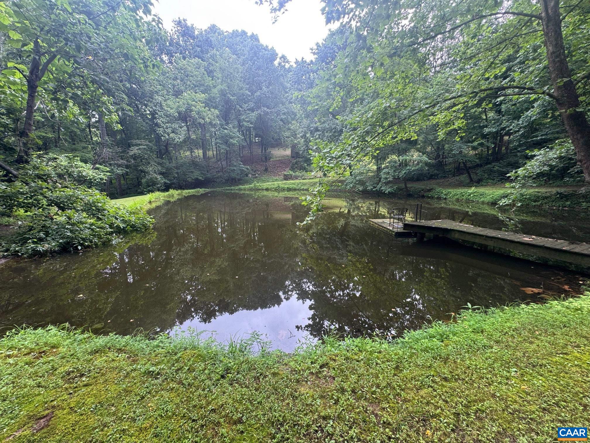 1950 Locust Hollow Road Charlottesville, VA 22903 - Photo 48 of 54 a view of a lake with a yard