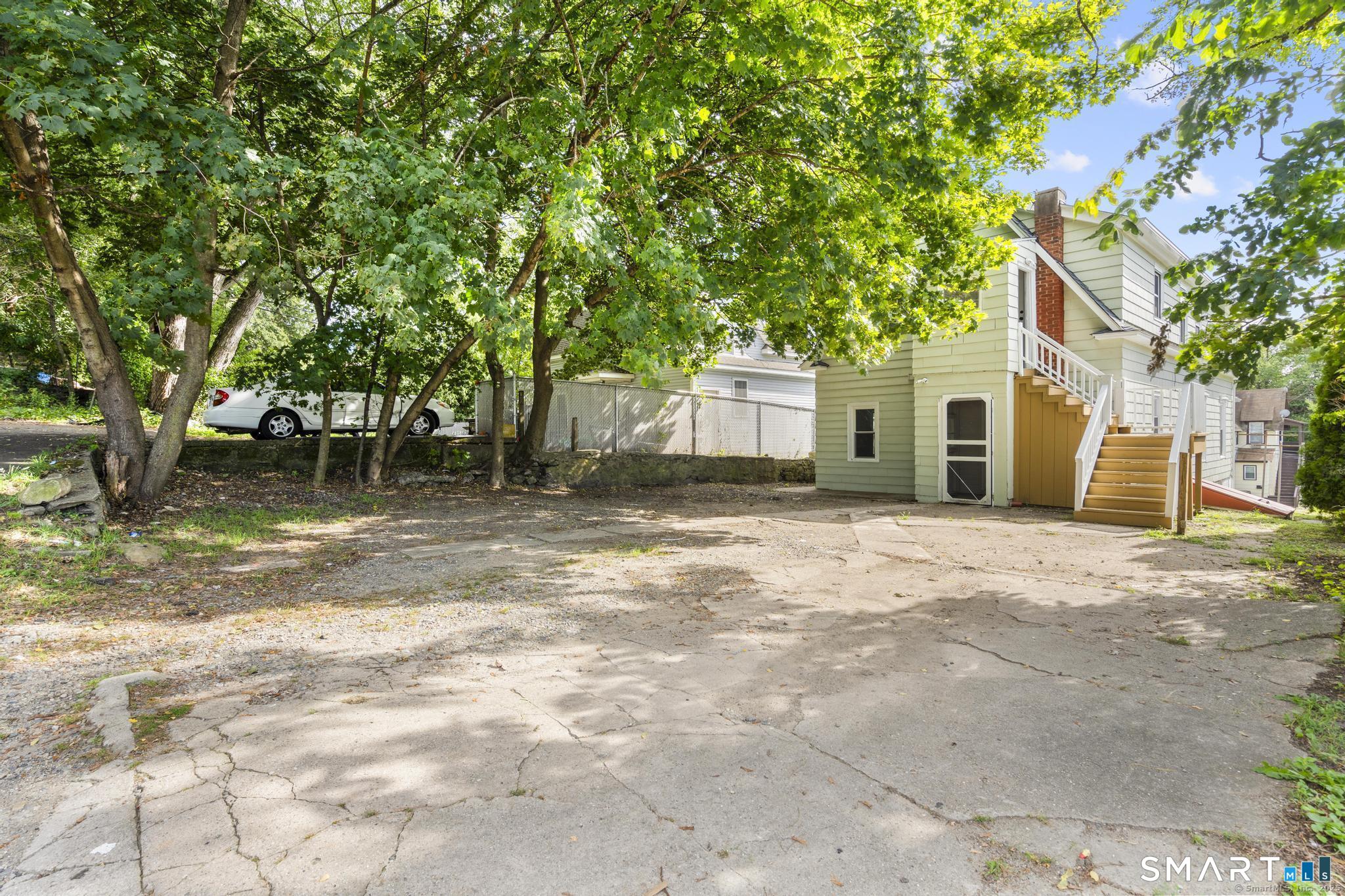 16 Oak Street Norwich, CT 06360 - Photo 20 of 20 Parking and Backyard