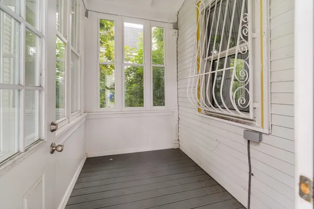 a view of a door and an entryway with a window