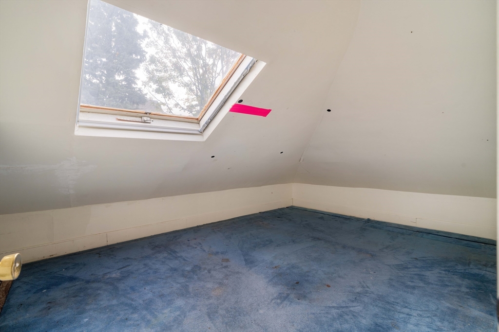 18 Westminster Avenue Boston, MA 02119 - Photo 26 of 37 an empty room with a window