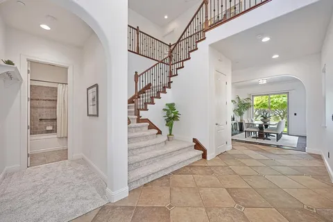 a view of a hallway with windows