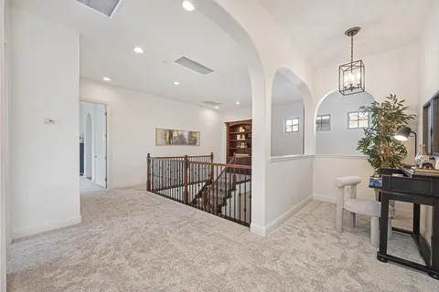 a view of a yard with swimming pool and sitting area