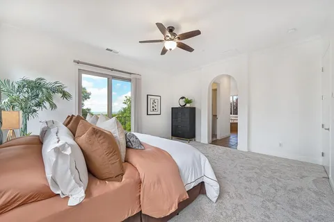 a view of a garden with sitting area