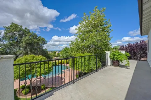 a view of a backyard with a sitting area