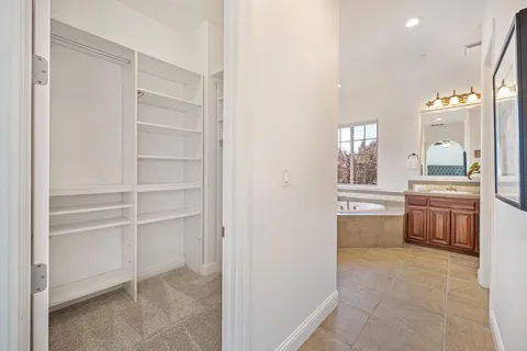 a view of a backyard with sitting area