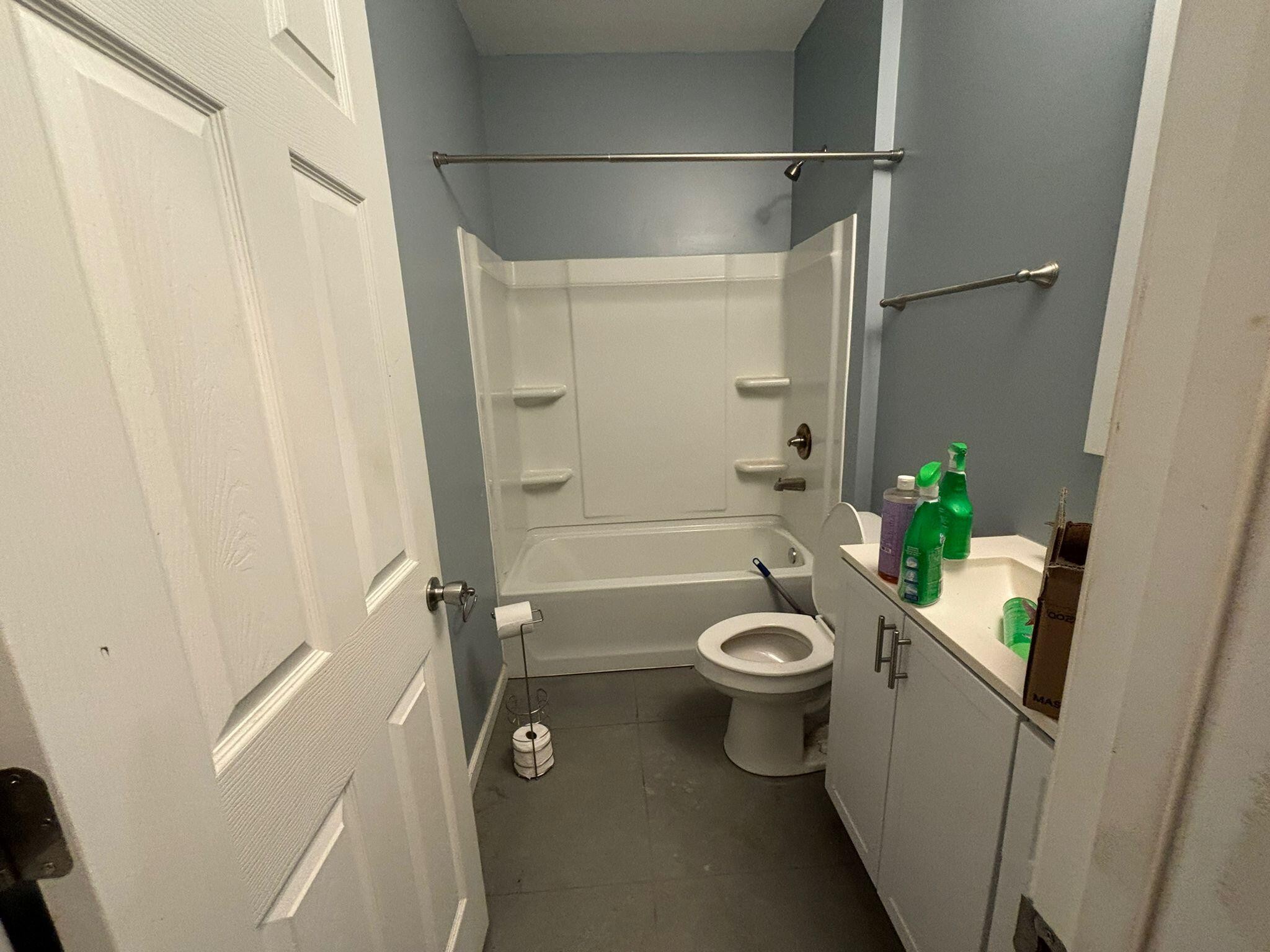 1919 Campground Road Drummonds, TN 38023 - Photo 24 of 47 a bathroom with a sink a toilet and shower