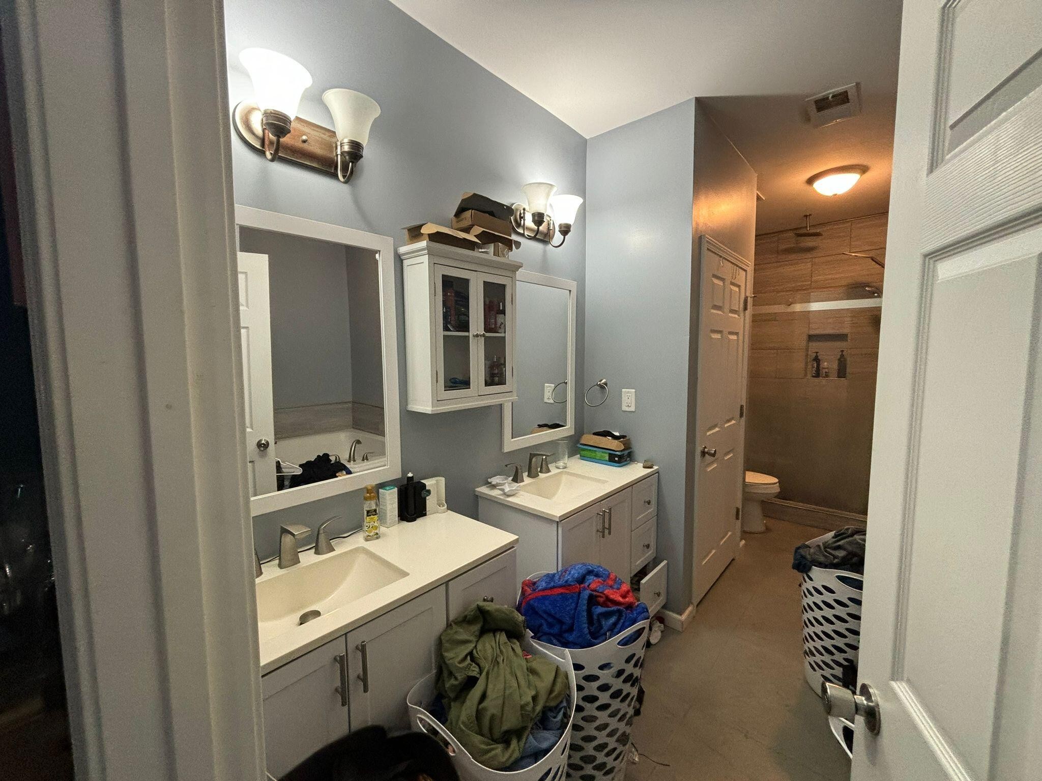 1919 Campground Road Drummonds, TN 38023 - Photo 25 of 47 a bathroom with a sink toilet and shower