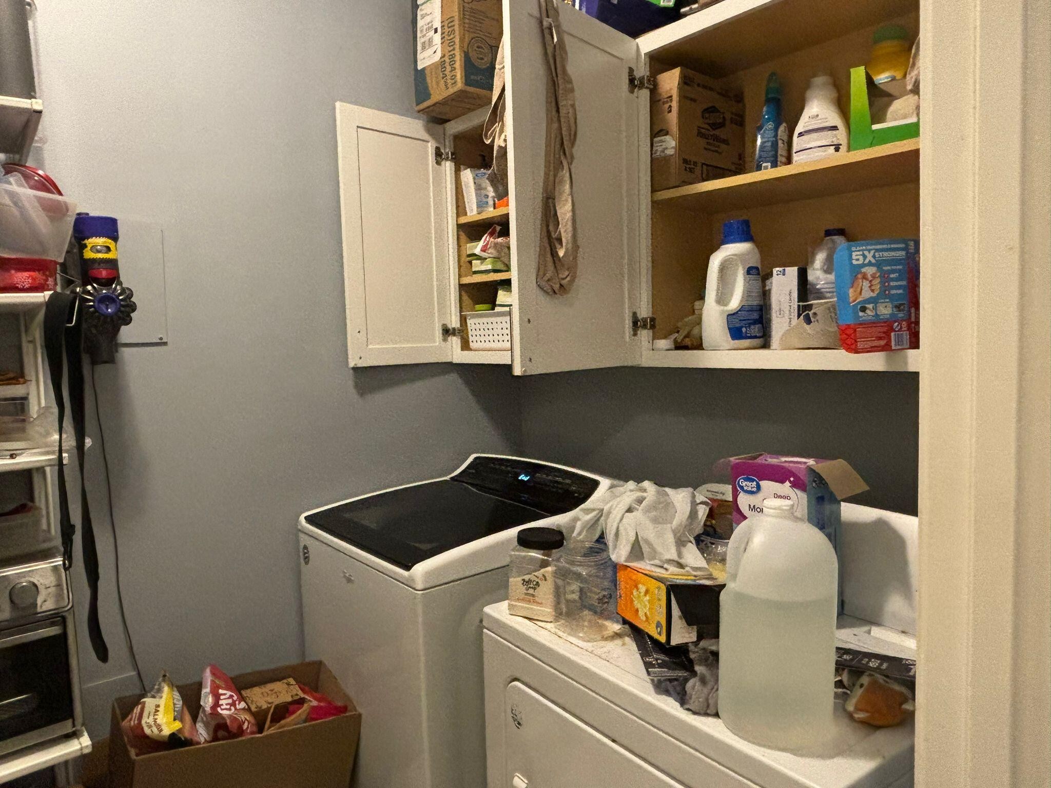 1919 Campground Road Drummonds, TN 38023 - Photo 29 of 47 a utility room with dryer and washer