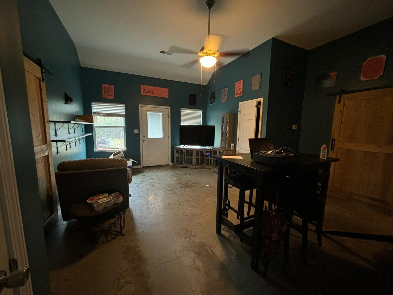 1919 Campground Road Drummonds, TN 38023 - Photo 3 of 47 a living room with furniture and a flat screen tv