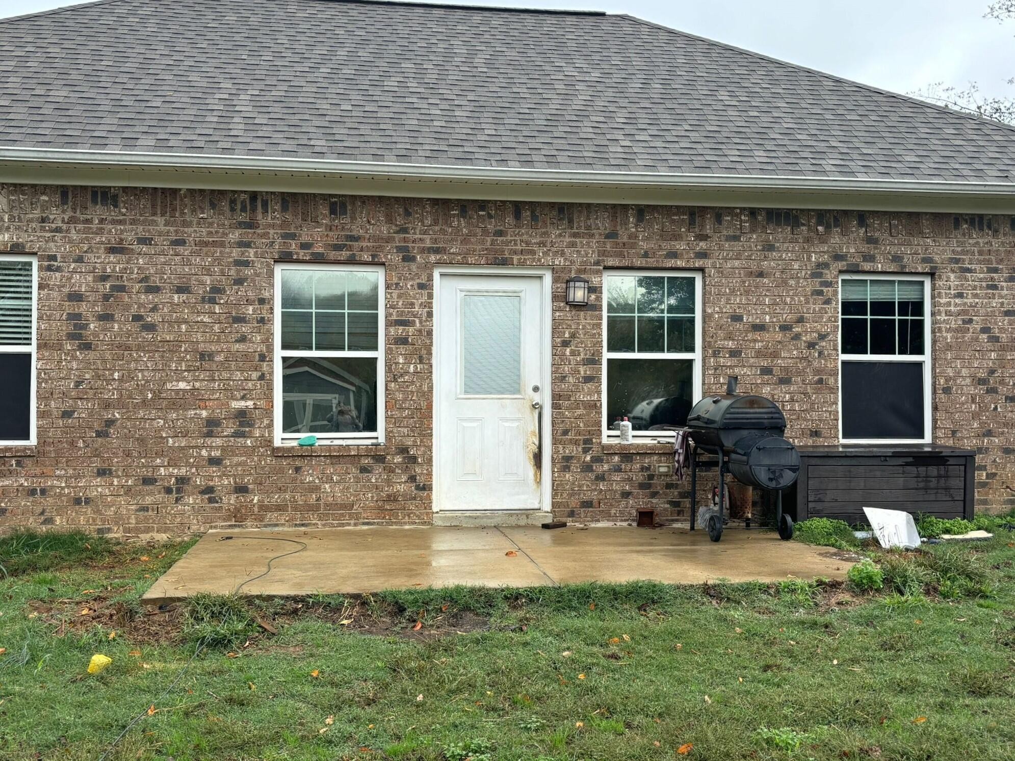 1919 Campground Road Drummonds, TN 38023 - Photo 47 of 47 a front view of a house with outdoor seating